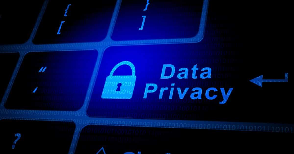 Illuminated keyboard key reading Data Privacy with a padlock icon, representing consent management in campaign tracking